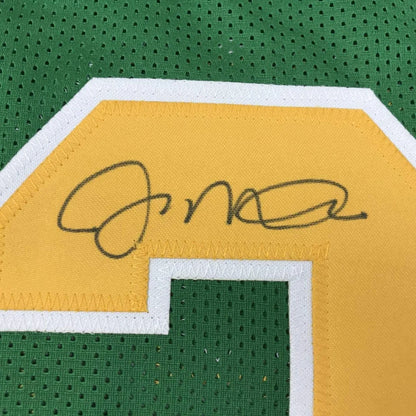 Green Joe Montana Notre Dame professional sports jersey with signature and yellow number