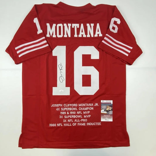 Back side of an autographed red custom football jersey with white lettering montana 16 from a professional sports league