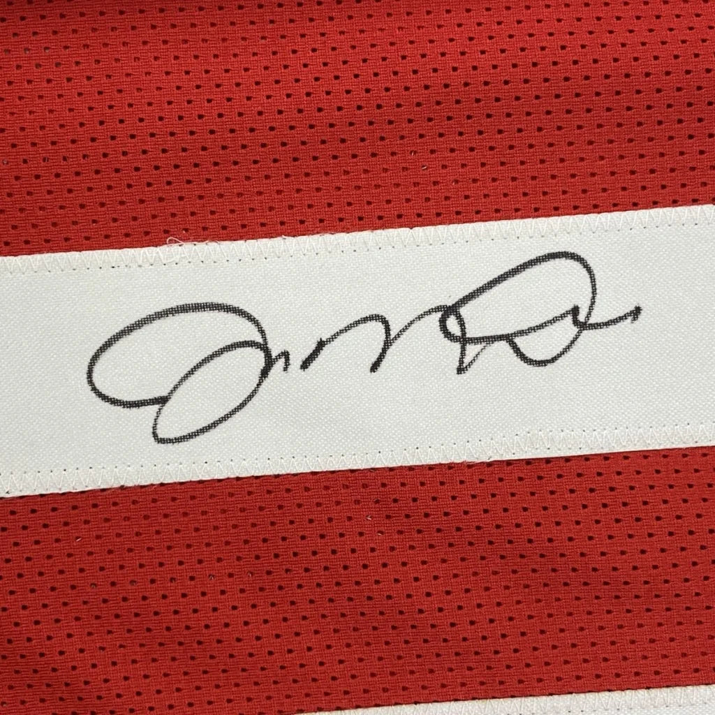Red mesh custom jersey with white stripe and black signature autographed by joe montana in professional sports league style