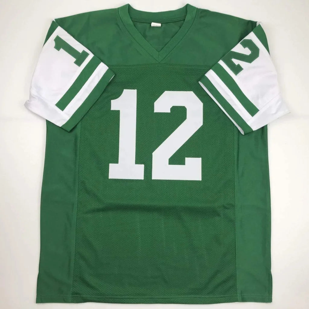 Green and white custom Joe Namath football jersey with number 12 v-neck and sleeve stripes from professional sports league