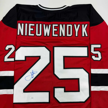 Autographed Joe Nieuwendyk New Jersey Red Hockey Jersey JSA COA | Certified Authentic Signed Memorabilia | vintageantiquesgifts.com