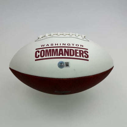 White and maroon Washington Commanders autographed football with official authentication