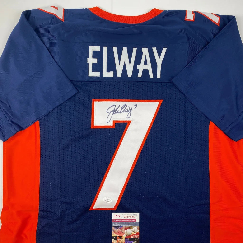 Back of a blue and orange denver broncos custom jersey with white elway nameplate and number 7 in bold white outlined in red