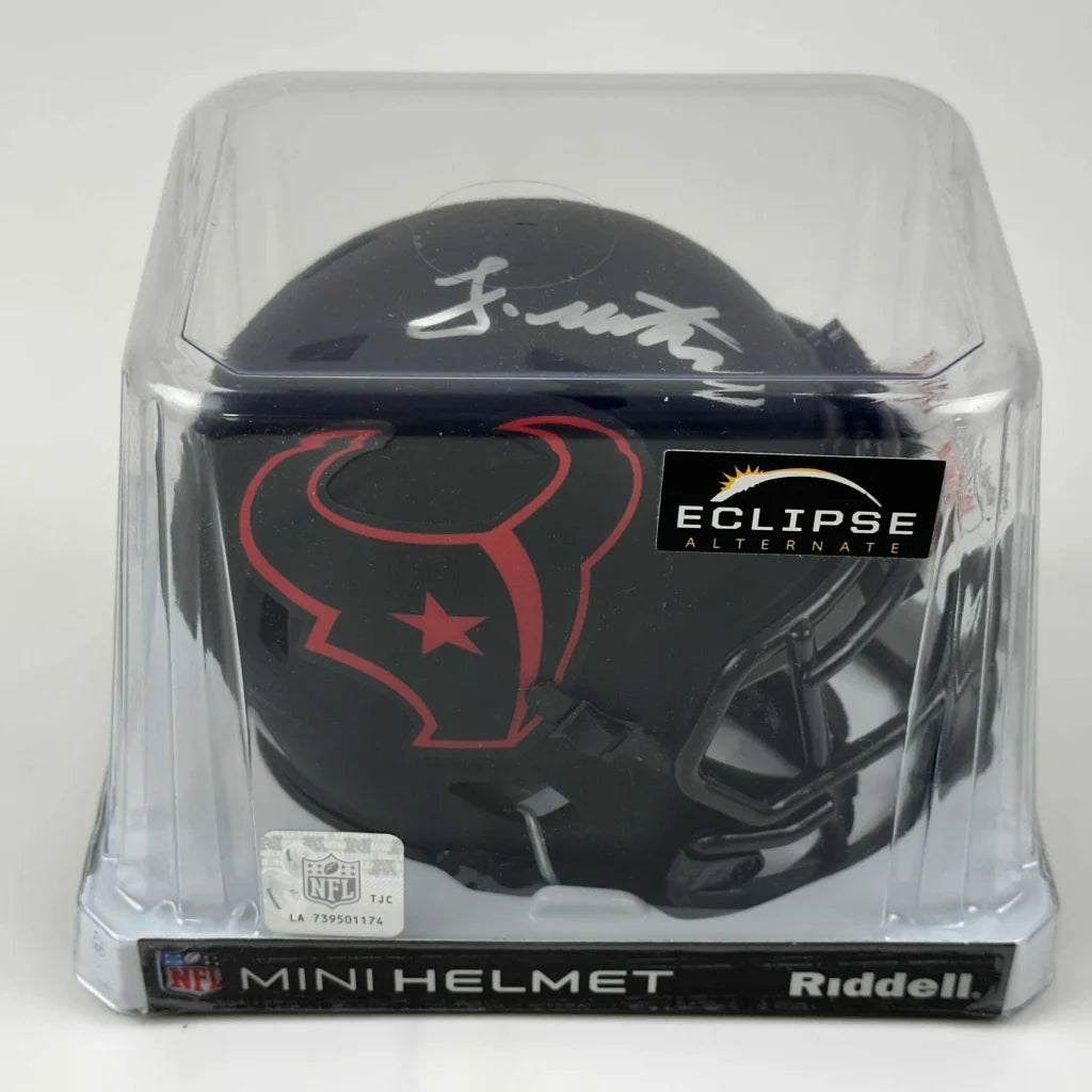 Autographed Houston Texans mini football helmet with third party authentication in display case