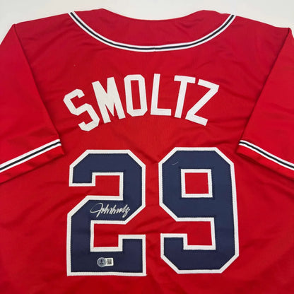 Autographed red SMOLTZ 29 custom jersey, perfect for pro sports league fans
