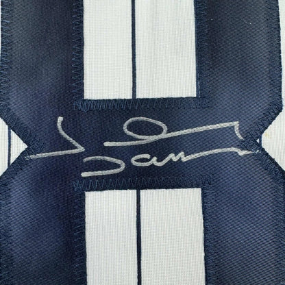 Autographed navy blue and white pinstriped custom jersey inspired by professional sports league