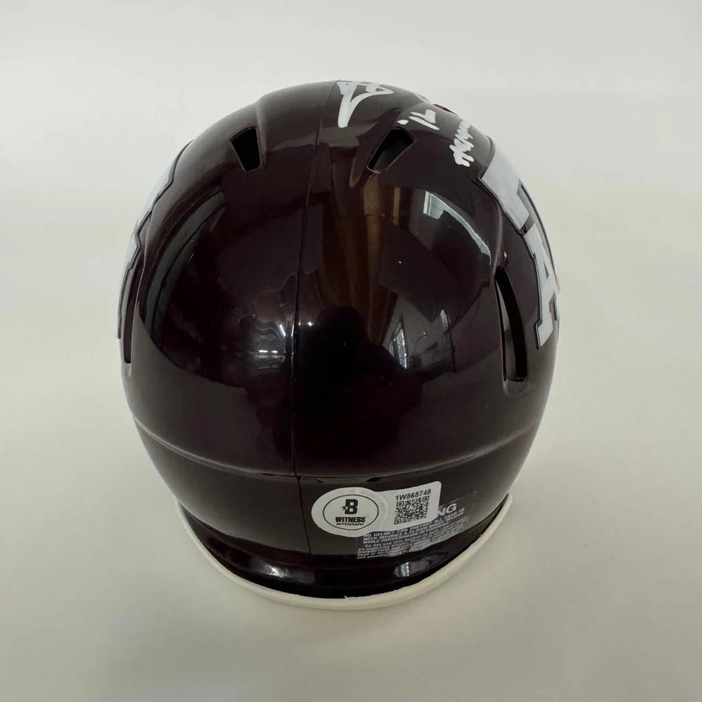 Dark brown Texas A&M football helmet with white lettering and third party authentication