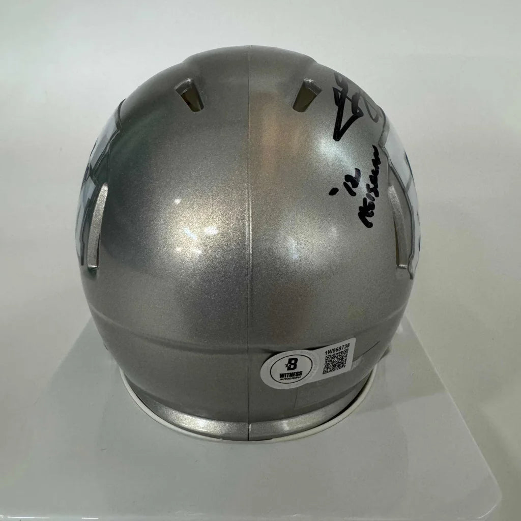 Silver football helmet with autograph showcasing third party authentication for Texas A&M fans