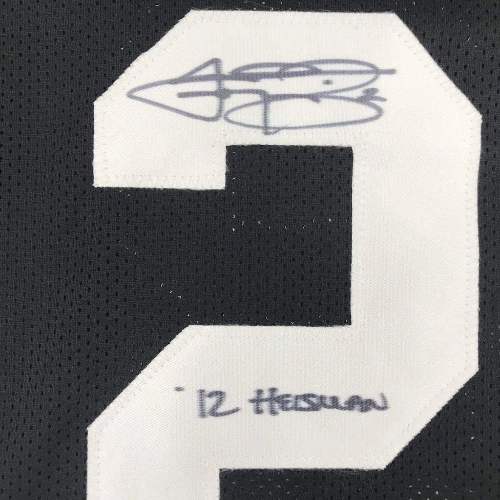 Back of black and white custom athletic jersey number 2 with signature from professional sports league player Johnny Manziel