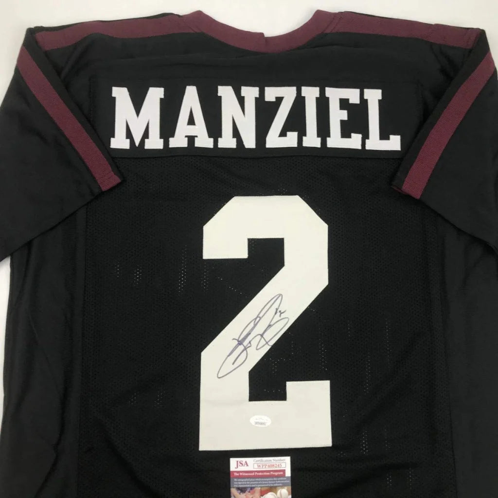 Back of a black Johnny Manziel Texas A&M college football custom jersey with maroon trim and white number 2 signed for professional sports league collectors