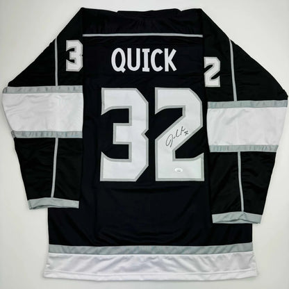 Black and white Los Angeles Kings custom jersey with QUICK 32 signature for sports league fans