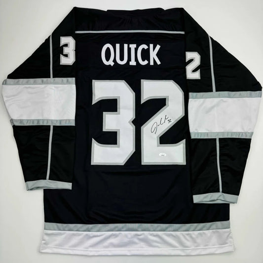 Black and white Los Angeles Kings custom jersey with QUICK 32 signature for sports league fans