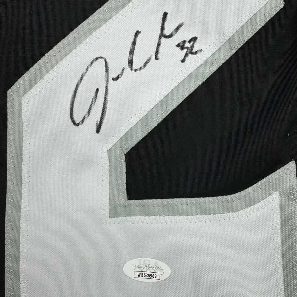 Autographed custom jersey with certification sticker from a professional sports league