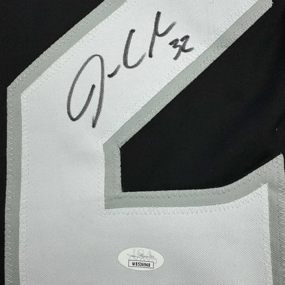 Autographed custom jersey with certification sticker from a professional sports league