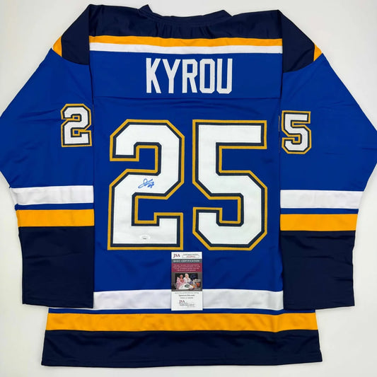 Autographed blue Jordan Kyrou hockey jersey with KYROU and 25 for sports memorabilia