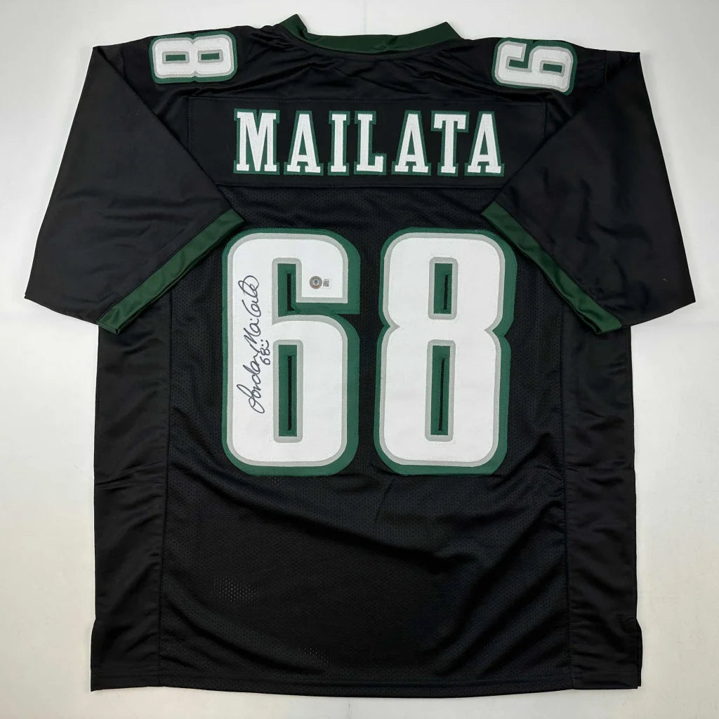 Black custom jersey from professional sports league with MAILATA 68 autograph