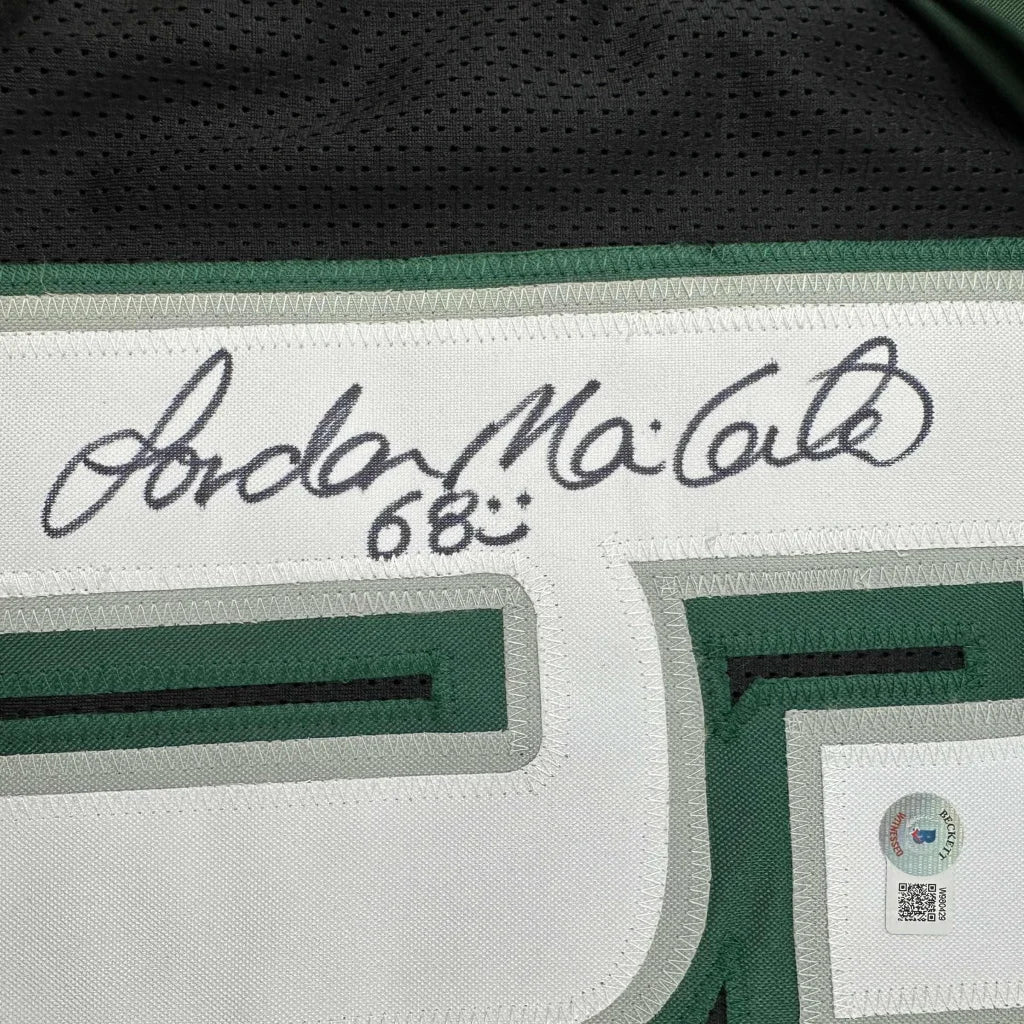 Autographed green and white custom jersey from a professional sports league