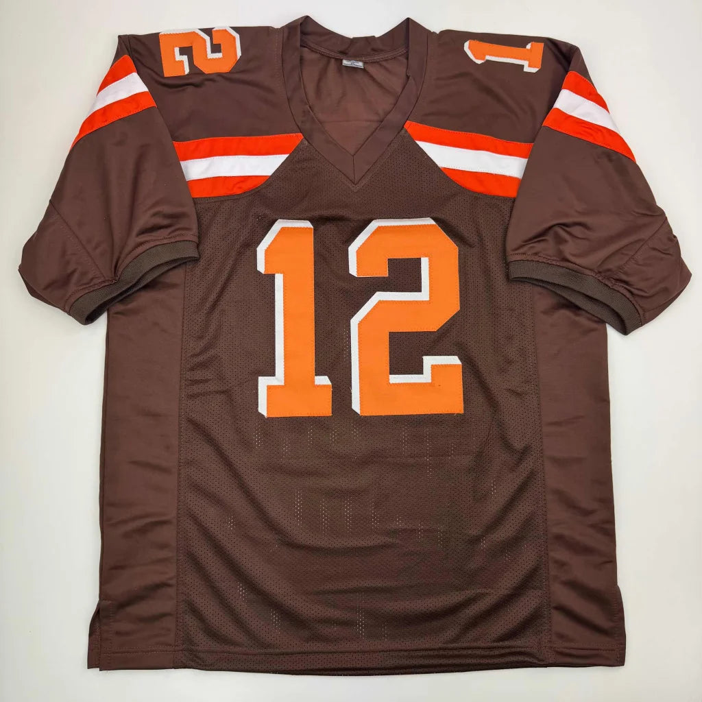 Signed Brown football jersey with orange and white stripes, number 12, for professional sports fans