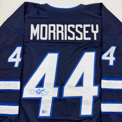 Autographed Josh Morrissey custom jersey in navy blue, Winnipeg professional sports league