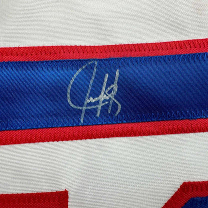 White fabric with blue and red stripe and silver autograph on custom jersey for sports league