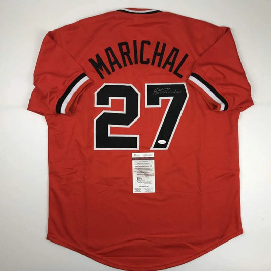 Back of autographed red Juan Marichal San Francisco baseball jersey with black and white lettering number 27 custom jersey