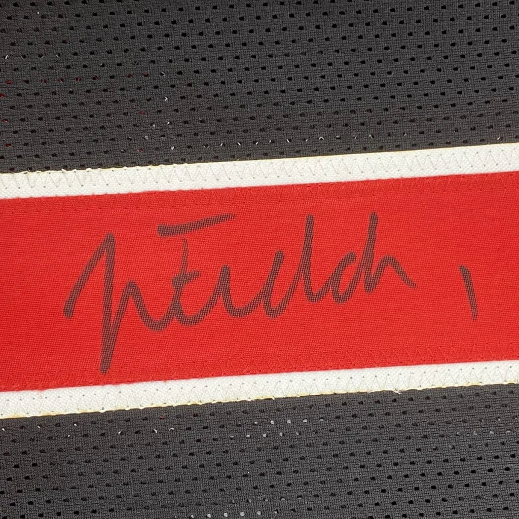 Autographed justin fields ohio state custom jersey with red and white stripes and black signature for professional sports fans