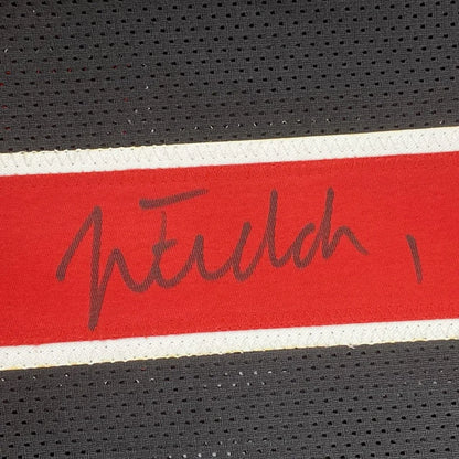 Autographed justin fields ohio state custom jersey with red and white stripes and black signature for professional sports fans
