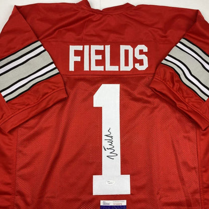 Autographed red ohio state buckeyes custom jersey signed by Justin Fields with silver black striped sleeves for professional sports fans