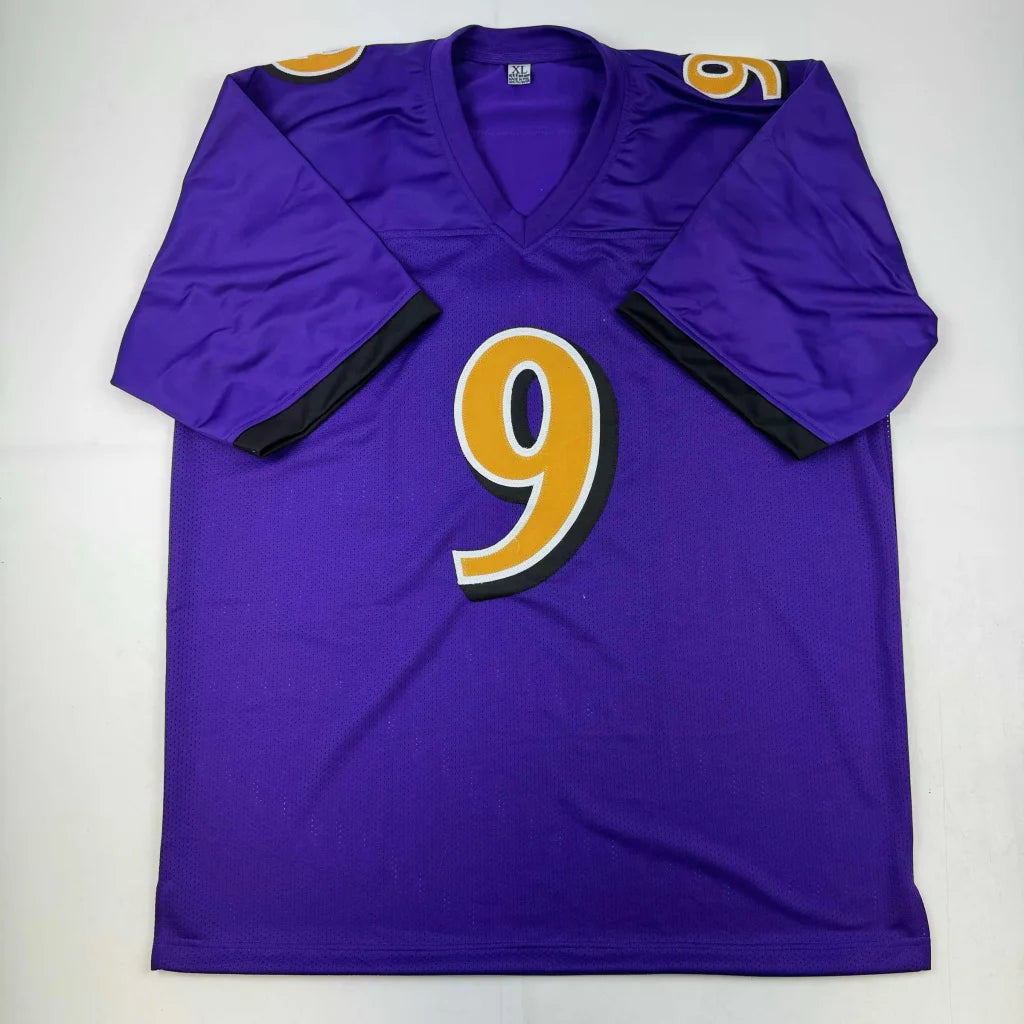 Autographed Justin Tucker purple Color Rush jersey with gold 9