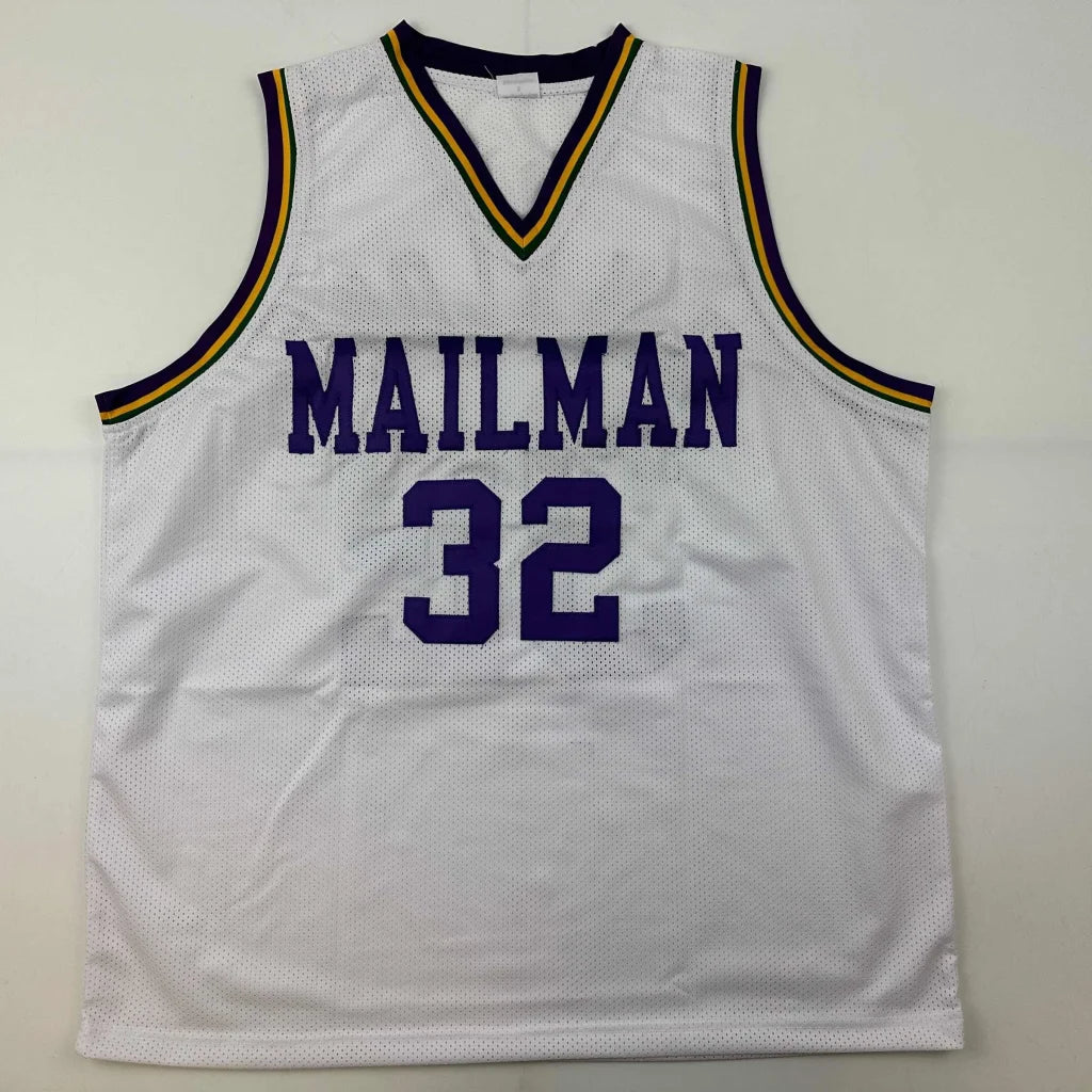 White custom jersey with purple, gold, and green trim from K Malone 32 professional sports league