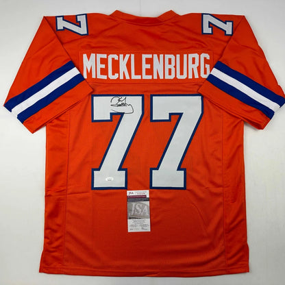 Orange denver broncos custom jersey number 77 signed by karl mecklenburg with jsa coa from a professional sports league