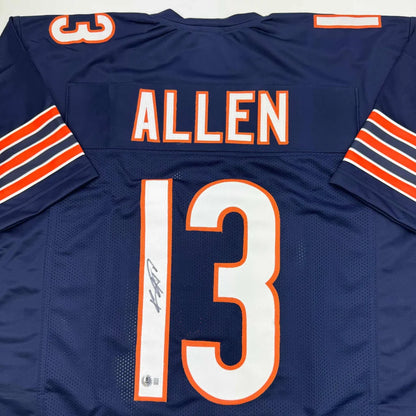 Navy blue professional sports league jersey with ALLEN 13 in white and orange trim