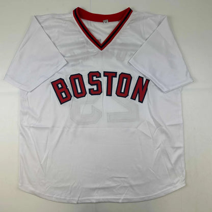 White short-sleeved custom jersey with red and black V-neck trim for professional sports fans