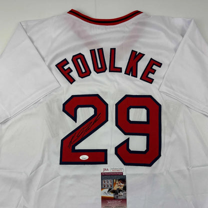 Autographed white baseball jersey with FOULKE 29 in red and blue for sports fans