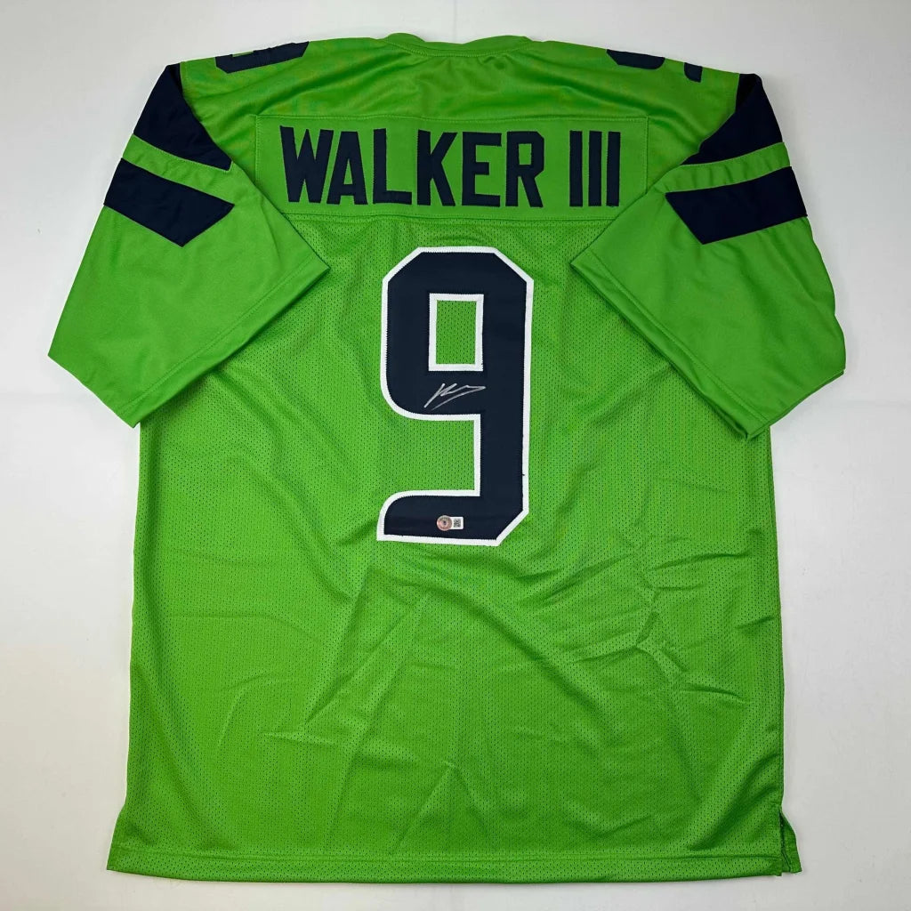 Bright green custom jersey with navy accents and signature, perfect for sports league fans