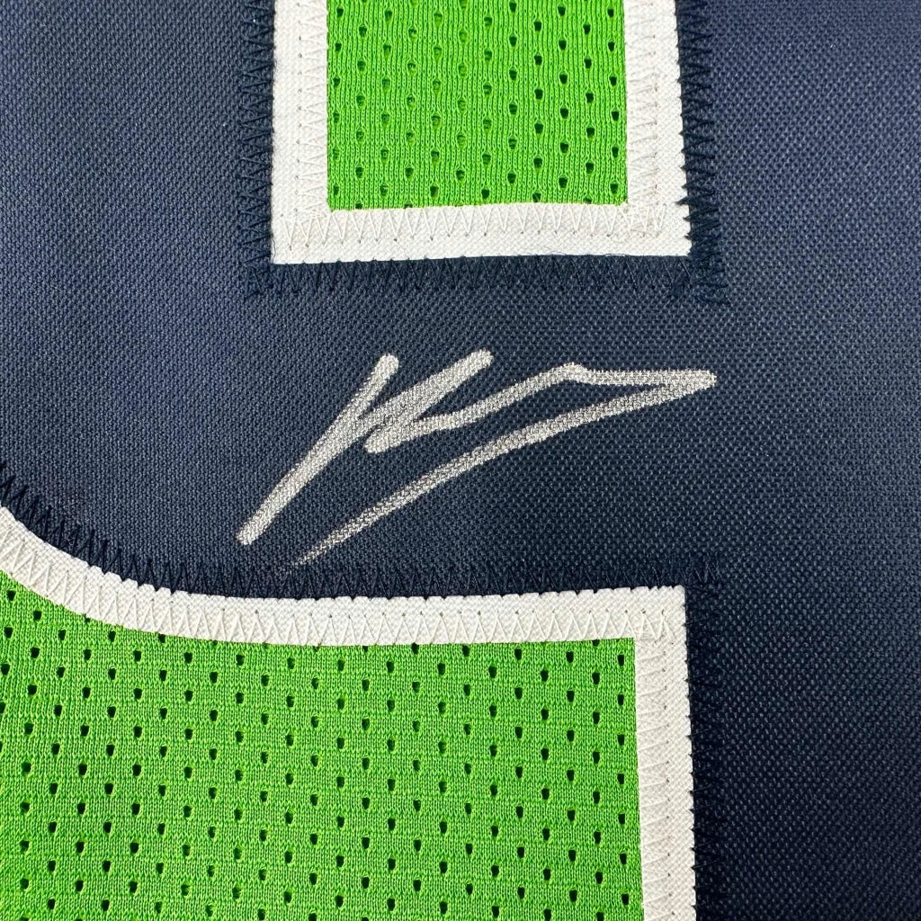Autographed dark blue lime green custom jersey from a pro sports league collectible