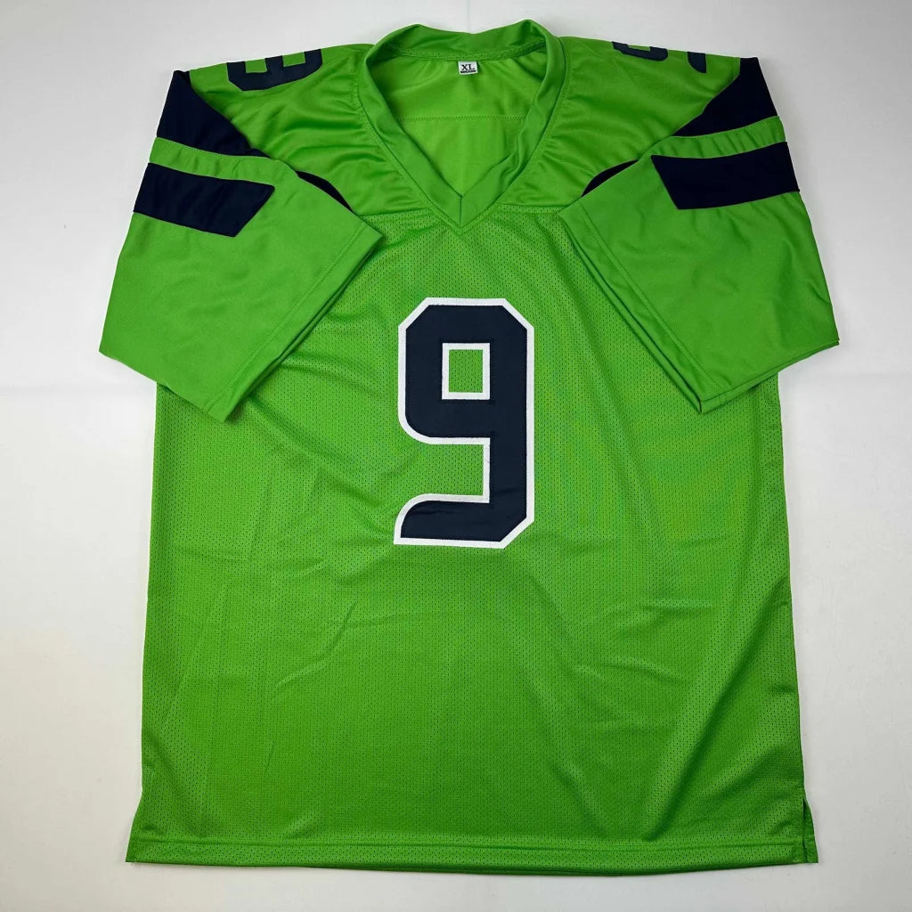 Bright green custom jersey with navy blue accents for professional sports fans