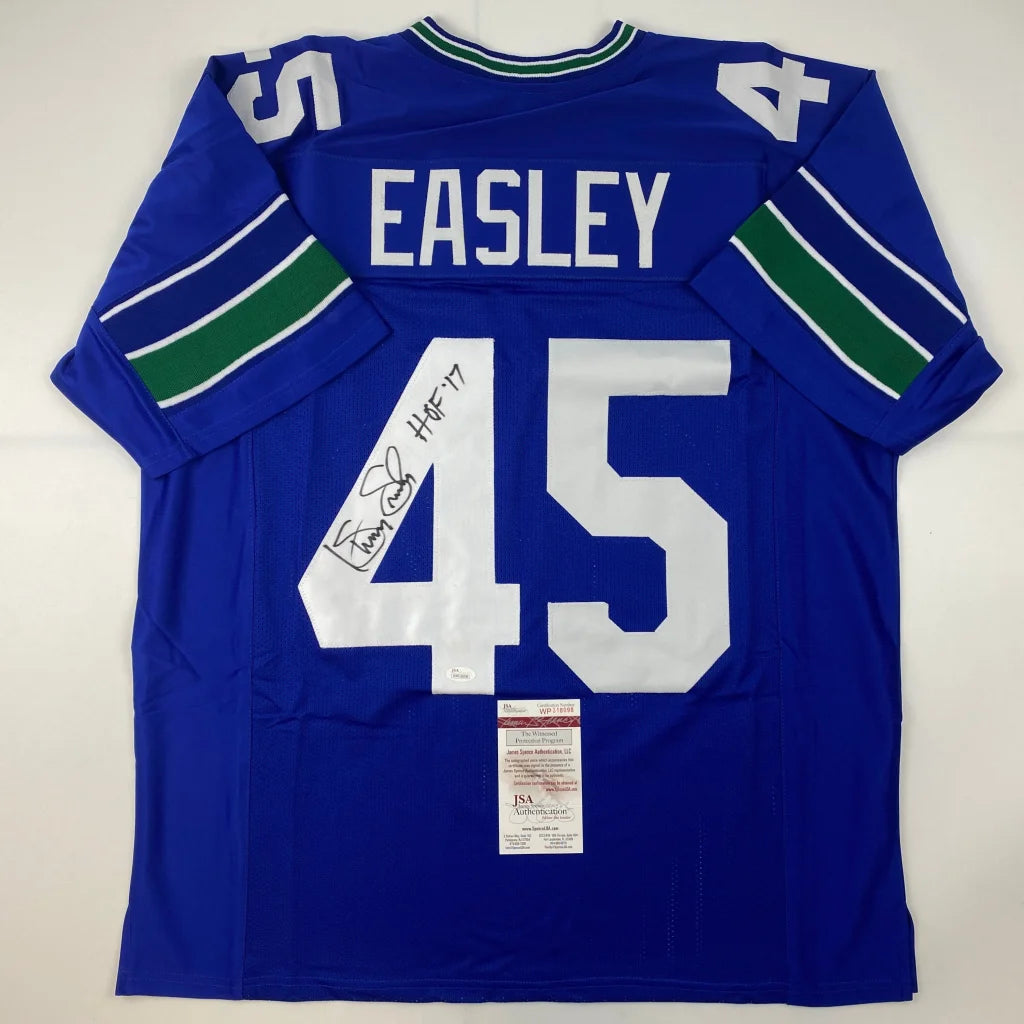 Royal blue professional sports league custom jersey with green stripes and HOF 17 autograph