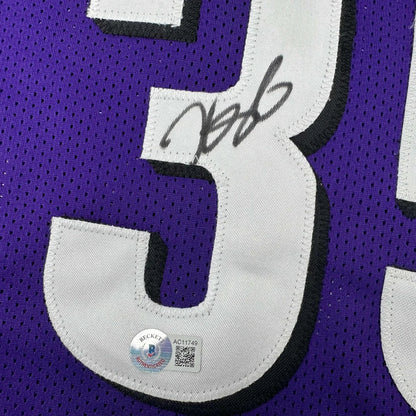 Purple basketball jersey with white and black number 3 and autograph for professional sports fans