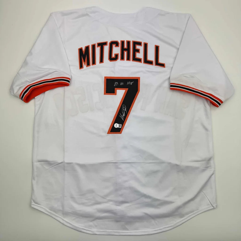 Back of san francisco white baseball custom jersey with mitchell 7 in black outlined in orange and red orange sleeve trim