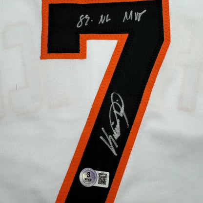 White baseball jersey featuring bold black number 7 outlined in orange with kevin mitchell autograph professional sports league