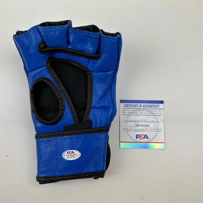 Authentic Blue MMA glove with PSA DNA third-party authentication stickers