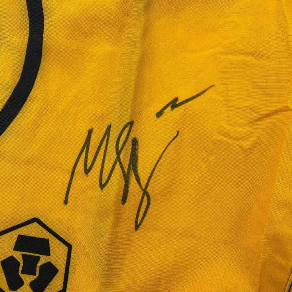 Yellow UFC Fight Shorts with Black Signature fabric close-up