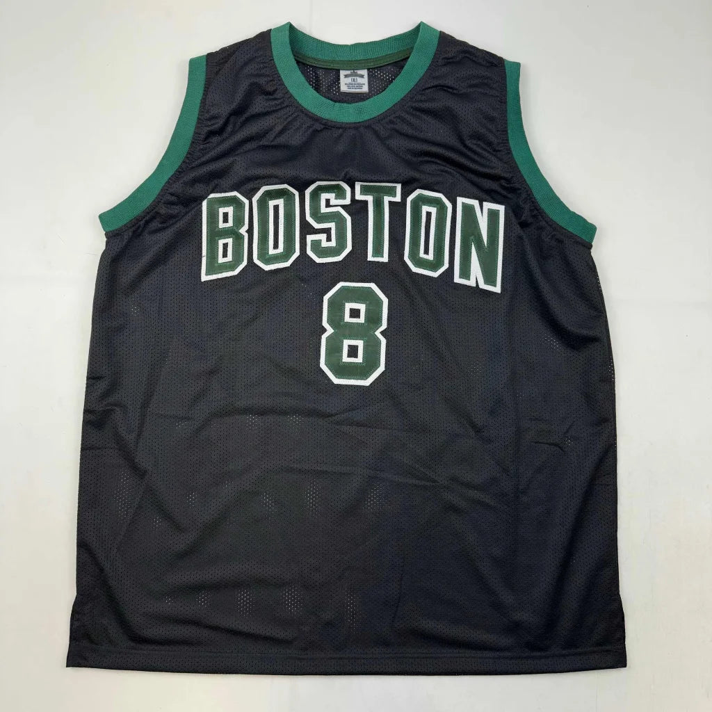 Black custom jersey with green trim and white number 8 from Porzingis professional sports league