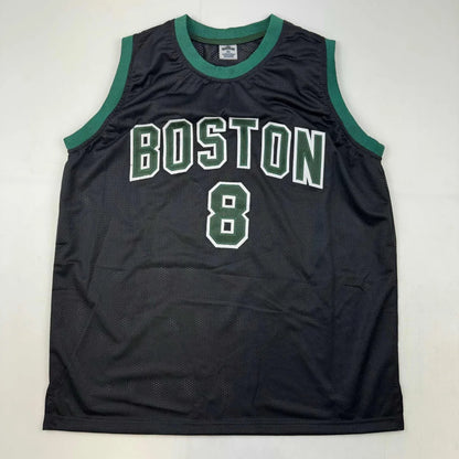 Black custom jersey with green trim and white number 8 from Porzingis professional sports league
