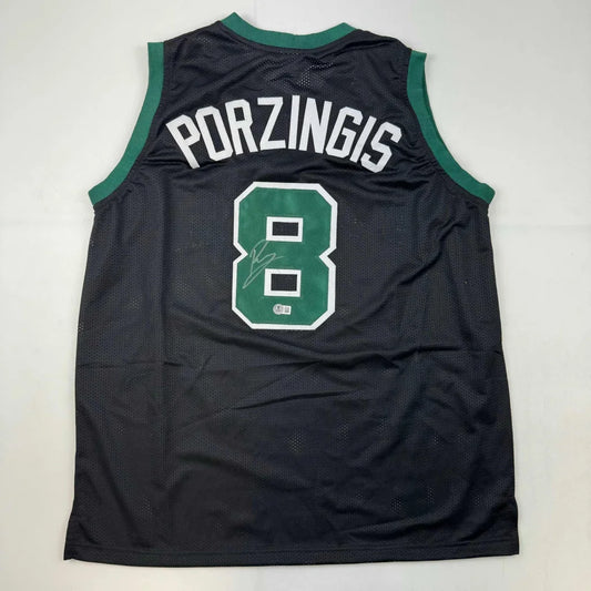 Black Porzingis custom jersey with green trim, signed, for professional sports fans
