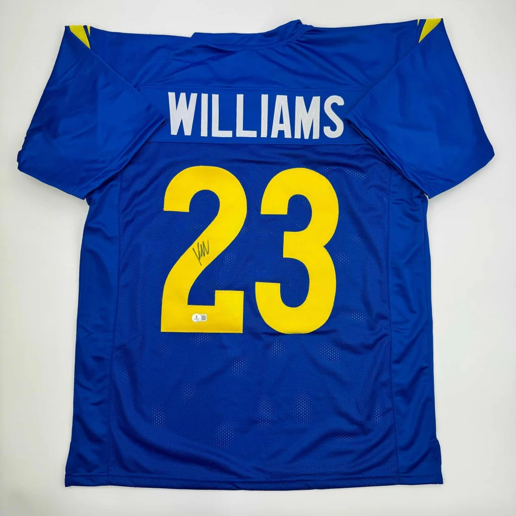 Blue custom jersey with yellow numbers and signature, perfect for professional sports fans