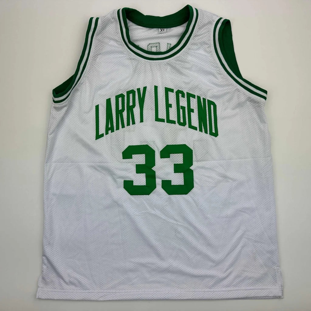 White mesh custom basketball jersey with green trim for professional sports league fans