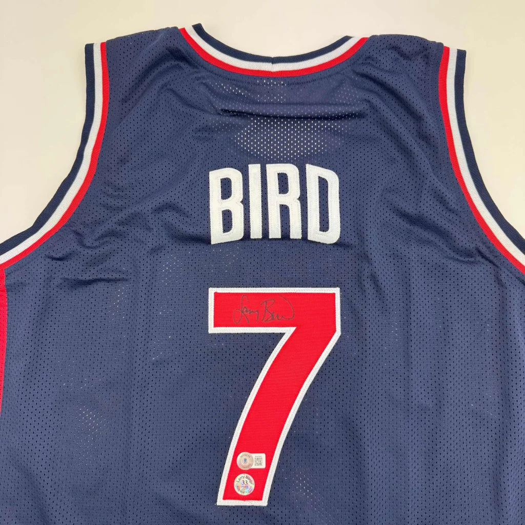 Autographed Larry Bird United States USA Blue 1992 Dream Team Basketball Jersey Beckett BAS COA | Certified Authentic Signed Memorabilia | vintageantiquesgifts.com