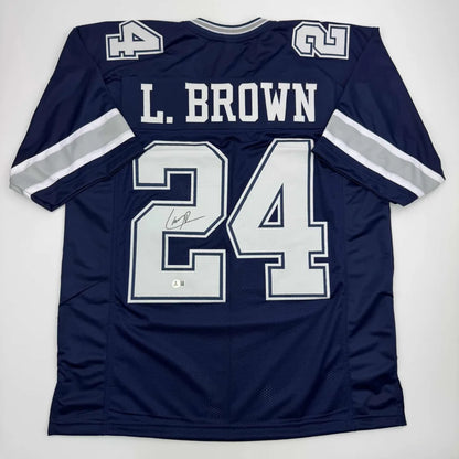 Dallas Cowboys navy blue custom jersey with L BROWN 24 from professional sports league